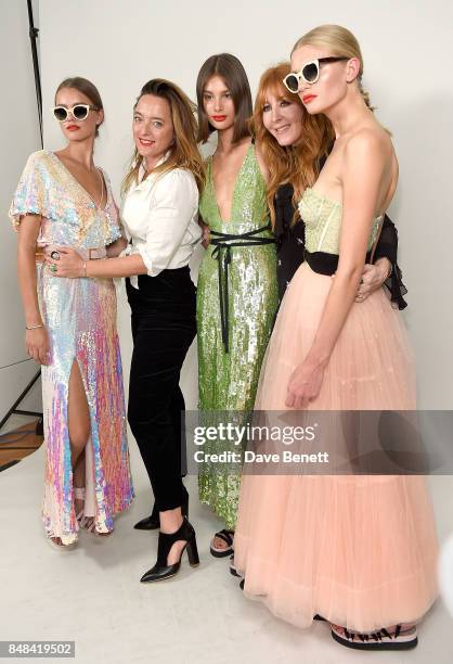 Alice Temperley and Charlotte Tilbury with models backstage at the Temperley London Fashion Show SS 18 during London Fashion Week at The Lindley Hall...