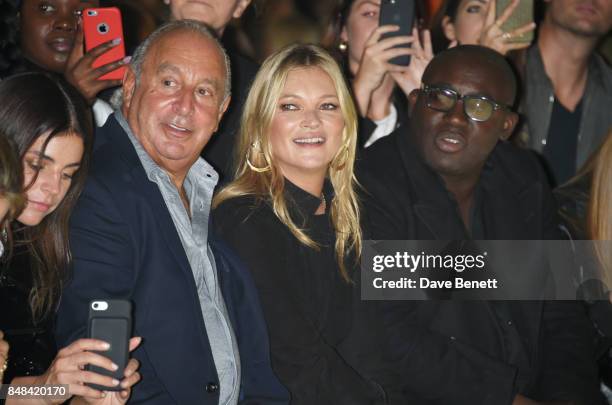 Sir Philip Green, Kate Moss and Edward Enninful attend Topshop's London Fashion Week show on September 17, 2017 in London, England.