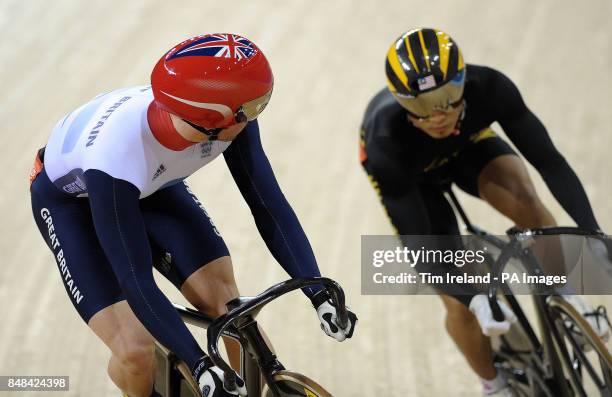 Great Britain's Jason Kenny in action against Malaysia's Azizulhasni Awang in the Men's Sprint Quarterfinals at the Velodrome in the Olympic Park,...