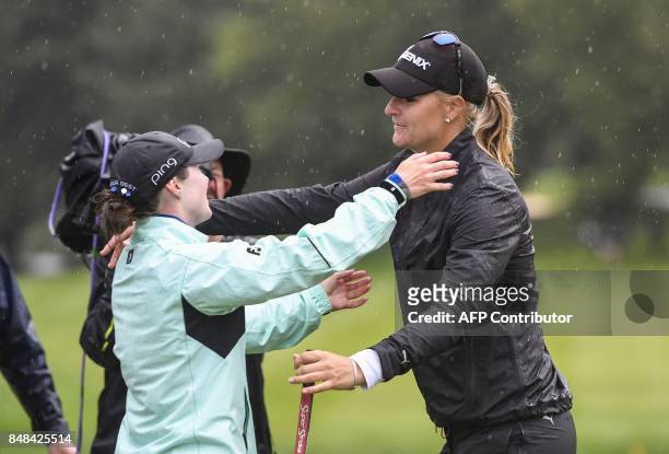 Anna Nordqvist from Sweden is congratulated byBrittany Altomare from United States after winning the Evian Championship tournament on September 17,...