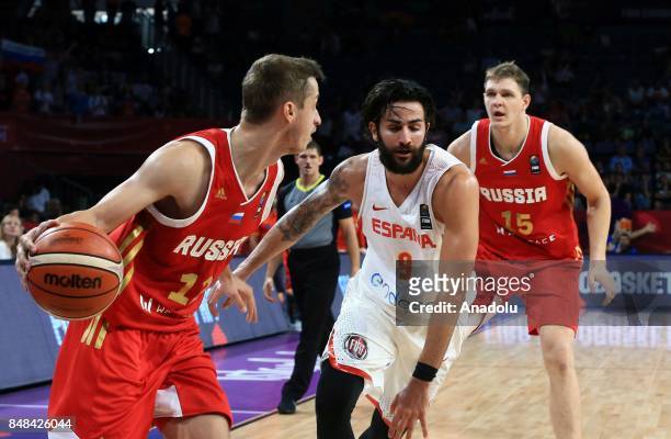 Ricky Rubio of Spain in action against Dmitry Khvostov and Timofey Mozgov of Russia during the FIBA Eurobasket 2017 consolation basketball match...