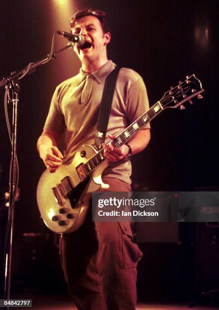 Photo of MANIC STREET PREACHERS and James Dean BRADFIELD; James Dean Bradfield performing live onstage, playing Gibson Les Paul guitar