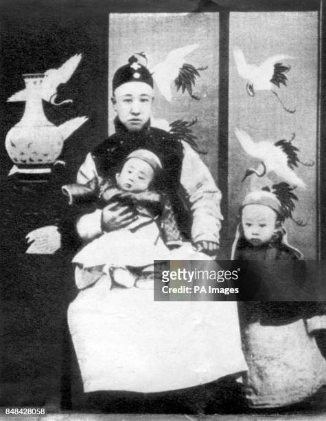 The three year old Aisin-Gioro Puyi, the Xuantong Emperor of China, who abdicated in 1912 and still lives in Peking under the name of Henry Puyi. He...