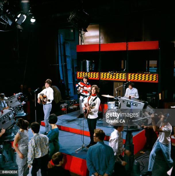 Photo of KINKS, Group performing on tv show at Wembley Studios L-R Ray Davies, Pete Quaife , Dave Davies and Mick Avory