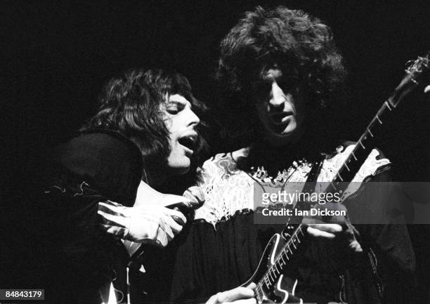 Photo of QUEEN and Freddie MERCURY and Brian MAY; Freddie Mercury and Brian May performing live on stage