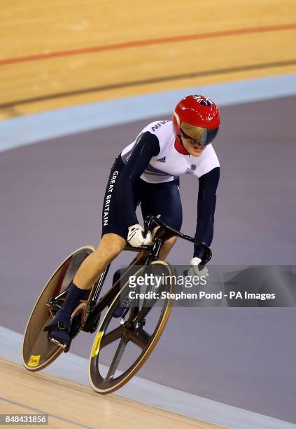 Great Britain's Victoria Pendleton secures victory over Russia's Ekaterina Gnidenko in the women's sprint at the Olympic Velodrome, London, on the...