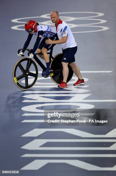 Great Britain's Victoria Pendleton is pushed out onto the track to compete in the women's sprint at the Olympic Velodrome, London, on the ninth day...