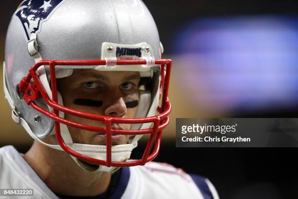 Tom Brady of the New England Patriots wams up before playing the New Orleans Saints at the Mercedes-Benz Superdome on September 17, 2017 in New...