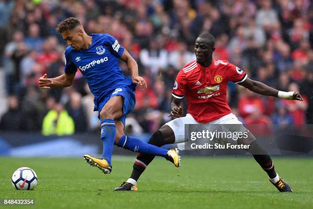 Eric Bailly of Manchester United fouls Dominic Calvert-Lewin of Everton during the Premier League match between Manchester United and Everton at Old...