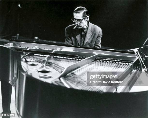 American jazz pianist Bill Evans at the piano during a performance by the Bill Evans trio filmed for the BBC Television music series 'Jazz 625' at...