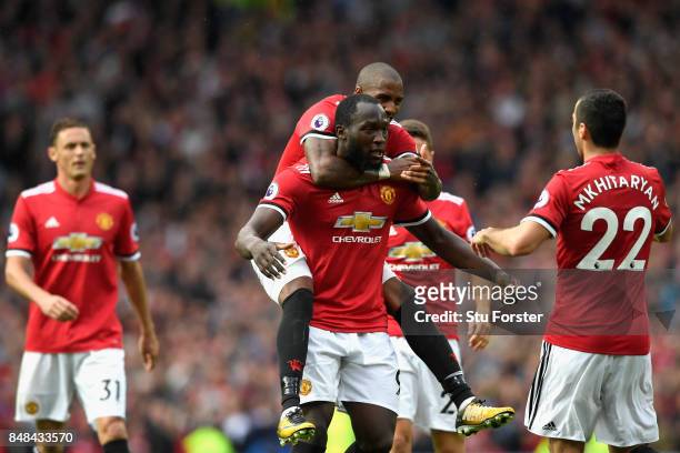 Henrikh Mkhitaryan of Manchester United celebrates scoring his sides second goal with Romelu Lukaku of Manchester United during the Premier League...