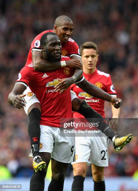 Romelu Lukaku of Manchester United celebrates his sides second goal with Ashley Young of Manchester United during the Premier League match between...