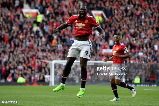 Romelu Lukaku of Manchester United celebrates scoring his sides third goal during the Premier League match between Manchester United and Everton at...