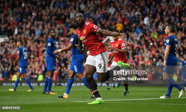 Romelu Lukaku of Manchester United celebrates scoring his sides third goal during the Premier League match between Manchester United and Everton at...