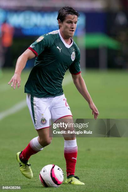 Carlos Fierro of Chivas drives the ball during the 9th round match between Chivas and Pumas UNAM as part of the Torneo Apertura 2017 Liga MX at...