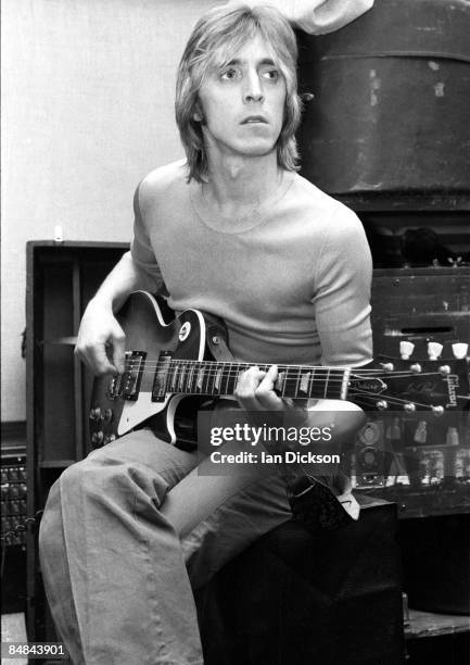Guitarist Mick Ronson from The Hunter Ronson Band posed at Air Studios in Oxford Street, London in 1974.