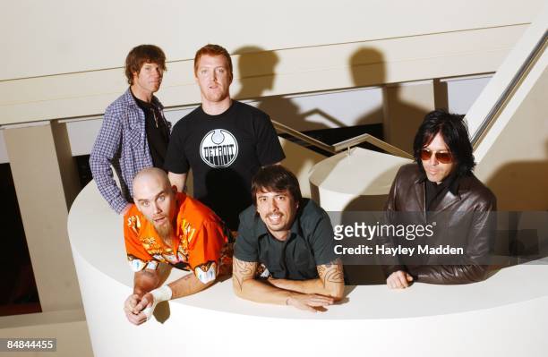 Photo of QUEENS OF THE STONE AGE; Top Row Mark Lanegan, Josh Homme, Bottom row from left Nick Oliveri, Dave Grohl, Troy Van Leeuwen