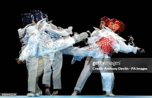 Image created using Nikon's built in multi exposure setting Jordan's Raya Hatahet competes against Mexico's Jannet Alegria Pena during the Women's...