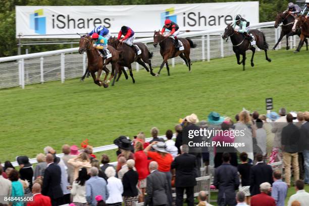 Wild Coco ridden by Tom Queally on his way to winning the iShares Fillies' Stakes during Ladies Day of the Glorious Goodwood Festival at Goodwood...