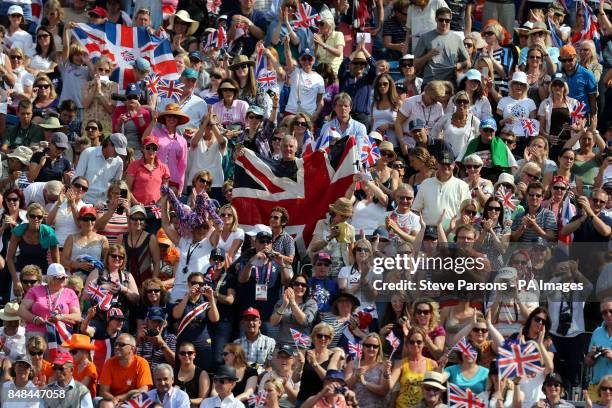 Crowds cheer on Great Britain's Charlotte Dujardin riding Valegro wins gold medal in the Equestrian Dressage Individual Grand Prix Freestyle at...