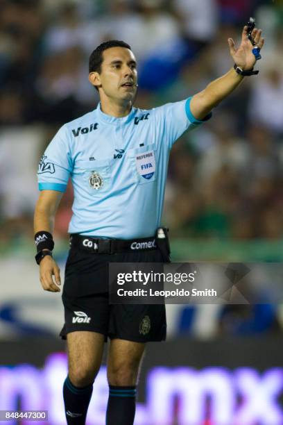 Referee Cesar Arturo Ramos gestures during the 9th round match between Leon and Pachuca as part of the Torneo Apertura 2017 Liga MX at Leon Stadium...