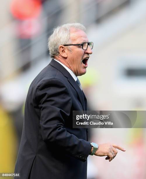 Head coach Udinese Calcio Luigi Del Neri reacts during the Serie A match between AC Milan and Udinese Calcio at Stadio Giuseppe Meazza on September...