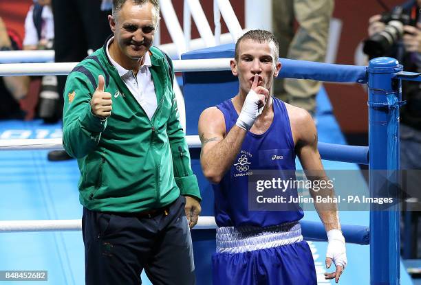 Ireland's John Joe Nevin celebrates with coach Billy Walsh after winning his bout with Cuba's Lazaro Alvarez Estrada in their Men's Boxing...