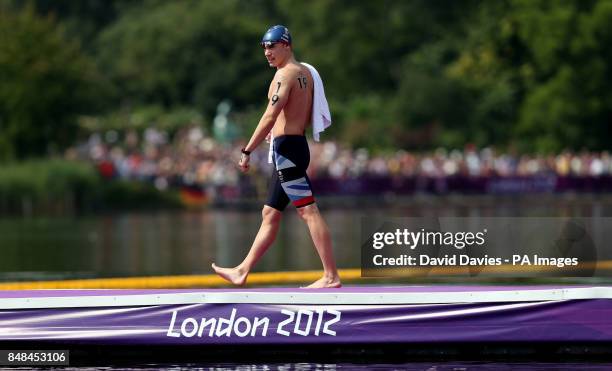 Great Britain's Daniel Fogg makes his way to the start of Men's Marathon Swim in the Serpentine at Hyde Park, London.