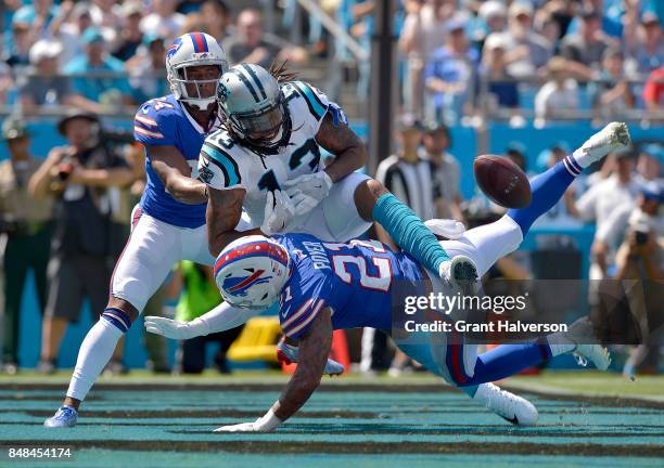 Jordan Poyer of the Buffalo Bills breaks up a pass intended for Kelvin Benjamin of the Carolina Panthers during their game at Bank of America Stadium...