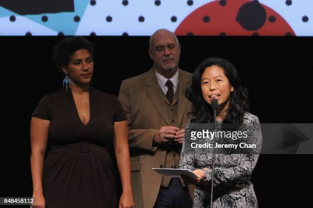 Canadian Jury member Min Sook Lee presents director Wayne Wapeemukwa with The City of Toronto Award for Best Canadian First Feature Film for...