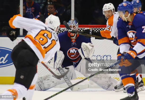Kristers Gudlevskis of the New York Islanders waits for a shot from Philippe Myers of the Philadelphia Flyers during the first period during a...