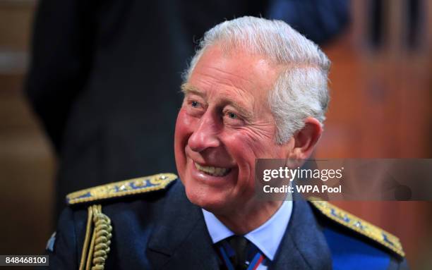 Prince Charles, Prince of Wales talks to Battle of Britain veterans during a reception following a a service to mark the 77th anniversary of the...