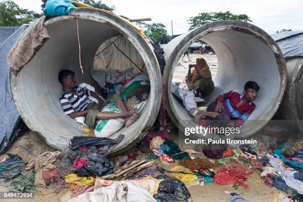 Rohingya rest inside a cement cylinder while a lack of shelters continues to be a massive problem September 17, 2017 in Kutupalong, Cox's Bazar,...