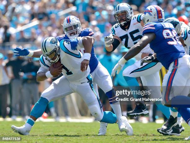 Jerry Hughes of the Buffalo Bills sacks Cam Newton of the Carolina Panthers during their game at Bank of America Stadium on September 17, 2017 in...