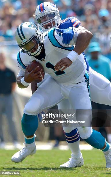 Jerry Hughes of the Buffalo Bills sacks Cam Newton of the Carolina Panthers during their game at Bank of America Stadium on September 17, 2017 in...