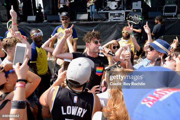 Max Kerman of Arkells performs in the crowd during the Meadows Music and Arts Festival - Day 3 at Citi Field on September 17, 2017 in New York City.