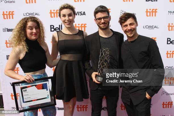 Producer Maria Gracia Turgeon, Pascale Drevillon, director Marc-Antoine Lemire and Alex Trahan pose after being awarded with The IWC Short Cuts Award...