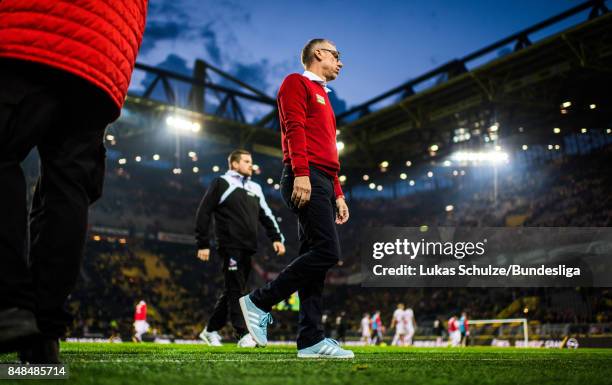 Head Coach Peter Stoeger of Koeln looks disappointed after loosing the Bundesliga match between Borussia Dortmund and 1. FC Koeln at Signal Iduna...