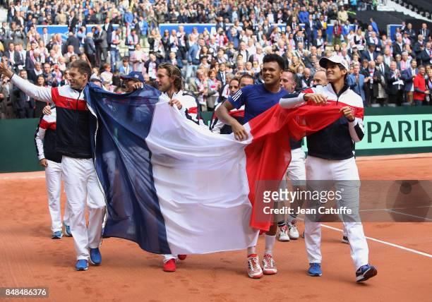Nicolas Mahut, Lucas Pouille, Jo-Wilfried Tsonga, Pierre-Hugues Herbert of France celebrate winning the tie on day three of the Davis Cup World Group...