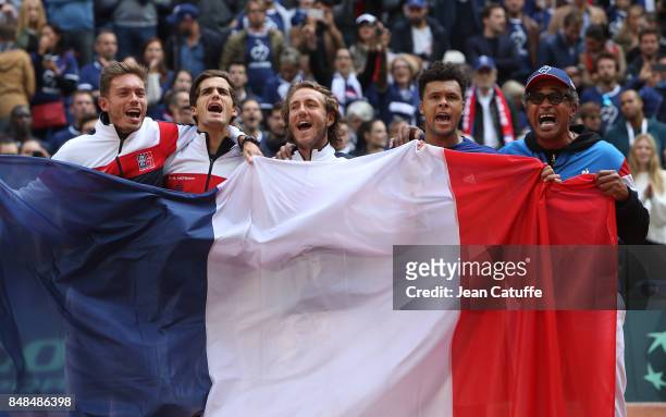 Nicolas Mahut, Pierre-Hugues Herbert, Lucas Pouille, Jo-Wilfried Tsonga and Captain of France Yannick Noah celebrate winning the tie on day three of...