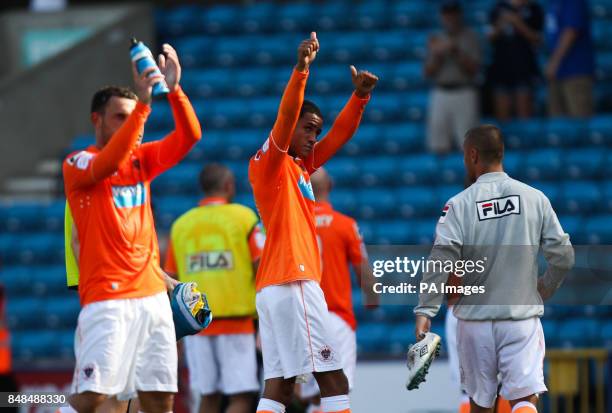 Blackpool's Thomas Ince thanks the fans at the end of the match during the npower Championship match at The Den, London.