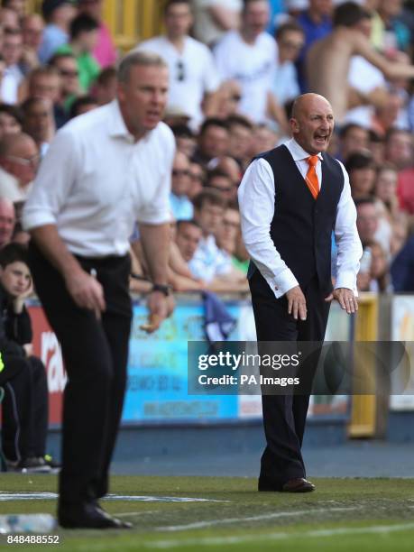 Blackpool's manager Ian Holloway shouts out instruction's to his players during the game during the npower Championship match at The Den, London.