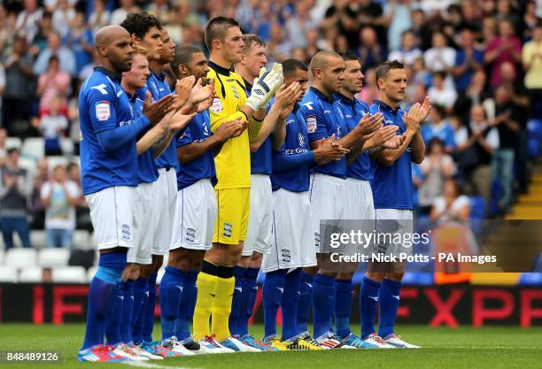 Birmingham City players during a minute's applause in memory of club legend Eddy Brown prior to kick-off.