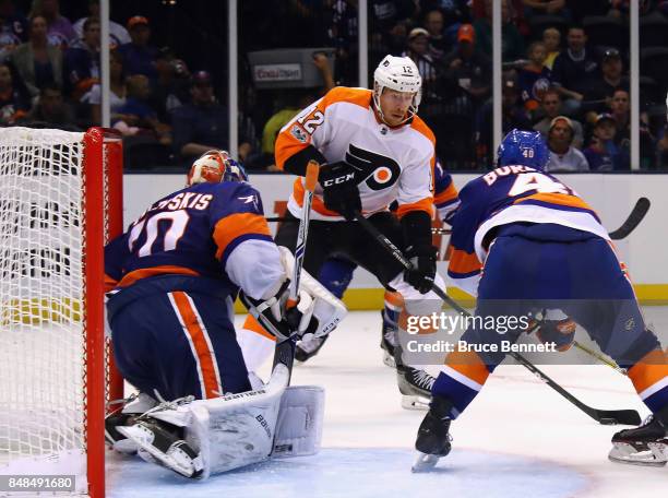 Michael Raffl of the Philadelphia Flyers moves in on Kristers Gudlevskis of the New York Islanders during the second period during a preseason game...