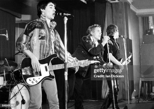 Photo of Steve JONES and Glen MATLOCK and Johnny ROTTEN and SEX PISTOLS, L-R: Glen Matlock, Johnny Rotten , Steve Jones performing live onstage