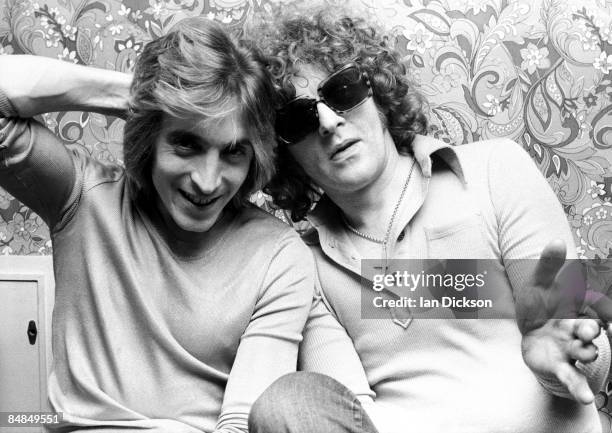 Guitarists Mick Ronson and Ian Hunter from The Hunter Ronson Band posed at Air Studios in Oxford Street, London in 1974.