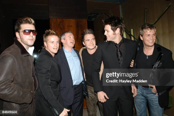 Photo of WESTLIFE and Louis WALSH; with their manager, Louis Walsh