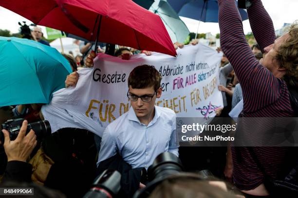 Participants in 'The March For Life't; are seen carrying crosses as they march through Berlin's Mitte district, on September 16, 2017. Under the...