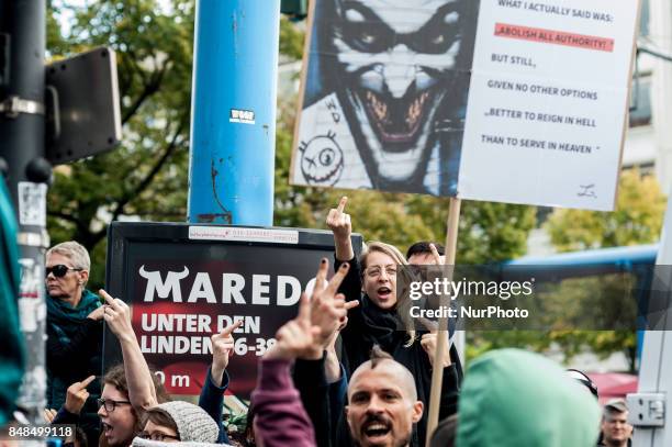 Counter-protesters shout parole in the direction of the demonstration in Berlin, Germany, on 16 September 2017. Under the motto &quot;Protect the...