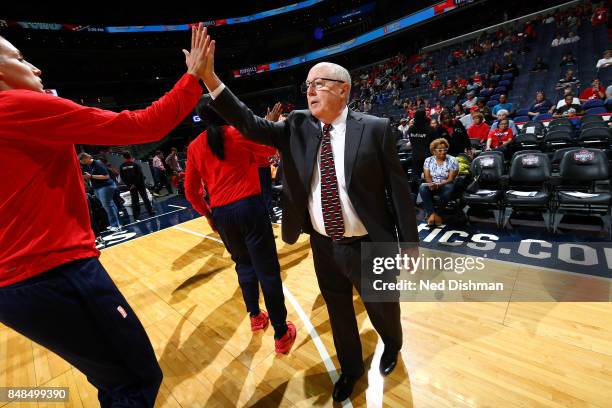 Mike Thibault of the Washington Mystics high fives Elena Delle Donne of the Washington Mystics before the game against the Minnesota Lynx in Game...